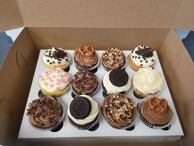 Box of decorated cupcakes